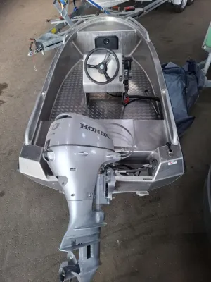 aluminium open boot met buitenboordmotor
