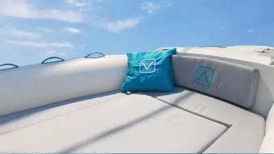 zonnedek met turquoise kussen