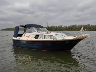cabinsloep op kalm water met kuiptent