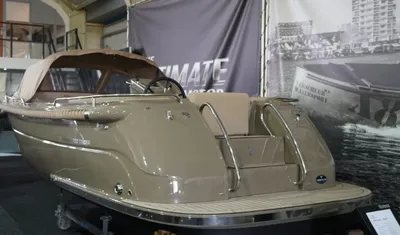 beige tender in showroom