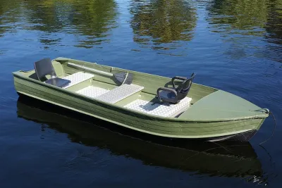 groene aluminium visboot op water